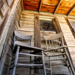Old porch chairs in Gold Field, NV